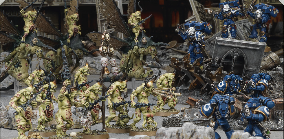 Plaguebearers attacking Space Marines